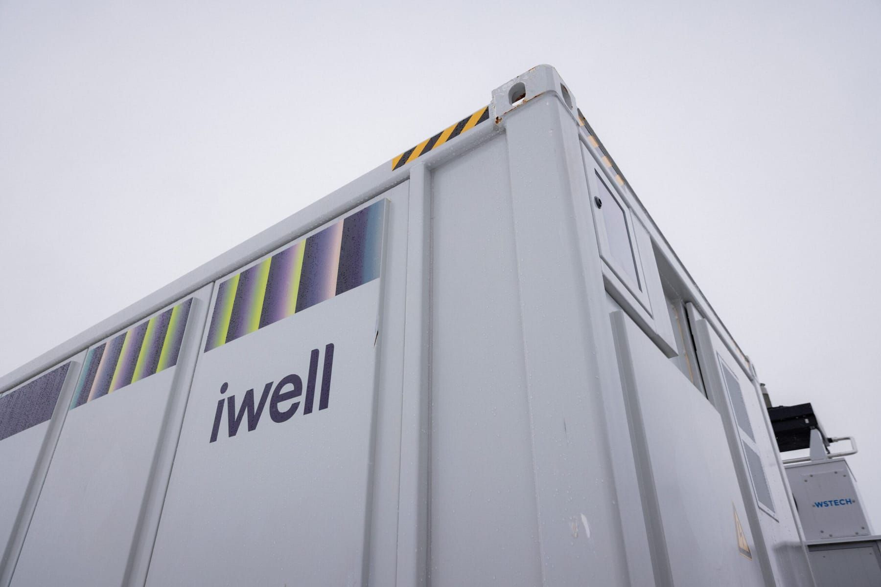AQ gaat haar tweede co-located batterijpark bouwen samen met iwell